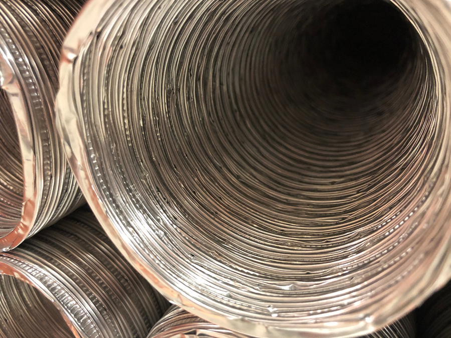 Clogged dryer vent full of lint — a common fire hazard in Tampa Bay homes
